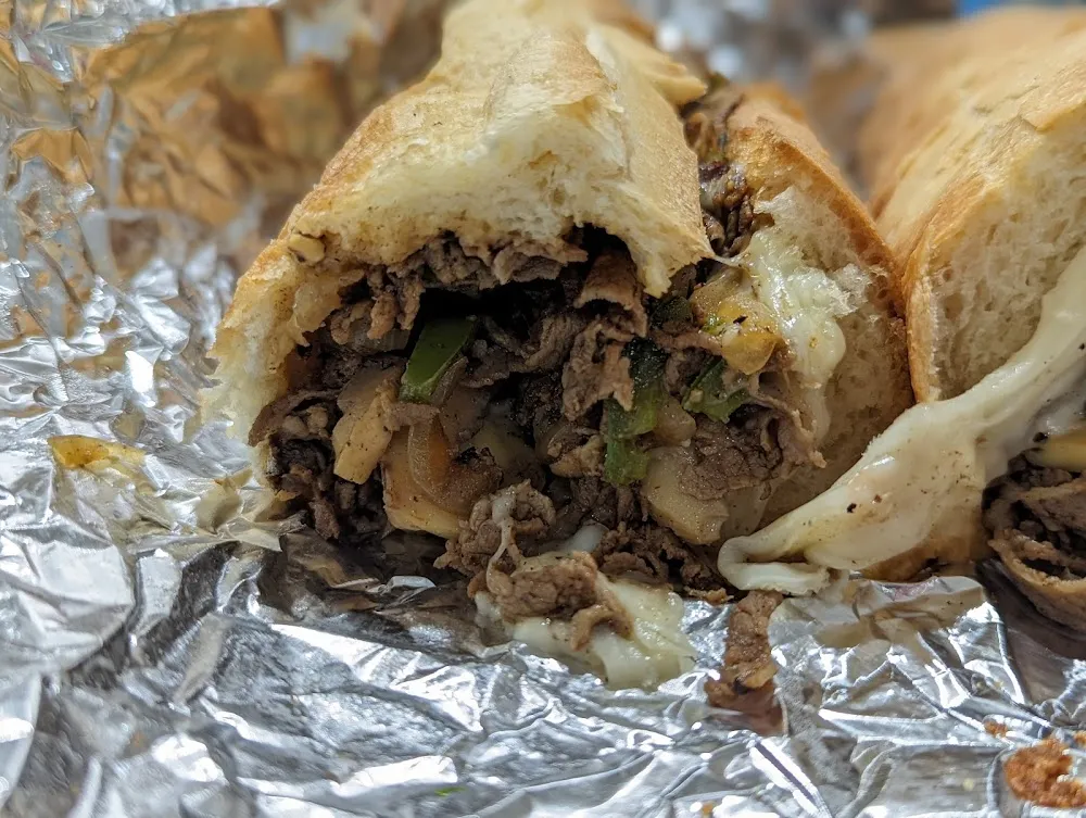 Steak and Cheese with Onions Peppers Mushrooms